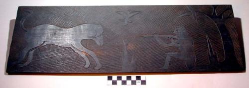 Carved ebony plaque