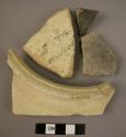 Ceramic rim and body sherds, black, grey and white ware, wheel made, undecorated