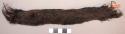 Fragment of human hair strap