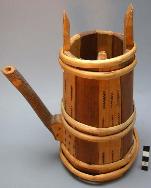 Wooden pitcher with wheels