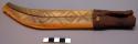 Sheath of knife made of 2 pieces of bone with incised geometric and +