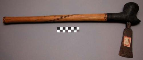 Native axe used for chopping wood, making wooden utensils