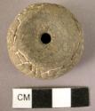 Pottery spindle whorl with incised and colored designs