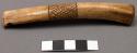 Bird or animal bone whistle or flute with incised decoration