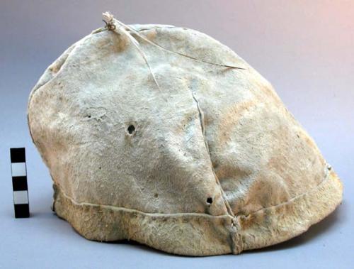 Men's buckskin cap with topknot of horsehair and feathers
