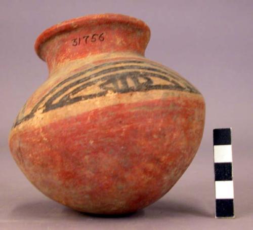 Pottery jar, red base with black and red ornament on upper yellow zone