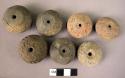 11 pottery spindle whorl with incised  and stamped designs