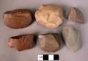 10 fragments of polished stone axe heads