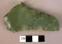 Flaked and chipped blade of lustrous grey-green chert.  3 1/2" L