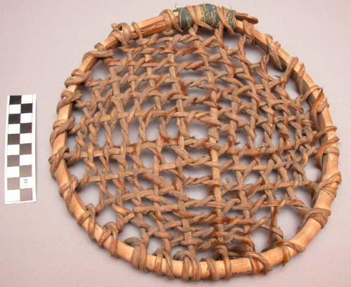 Hoop with rawhide lashings--for throwing game