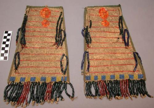Pair of aprons, possibly Omaha. Quillwork, beadwork, fringe and edging.