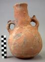 2-handled long-necked pottery bottle