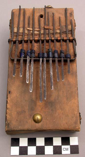 Musical instrument with sounding board and iron keys