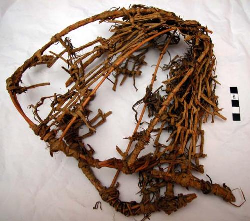 Wrapped weave basketry cap. worn by girls herding sheep