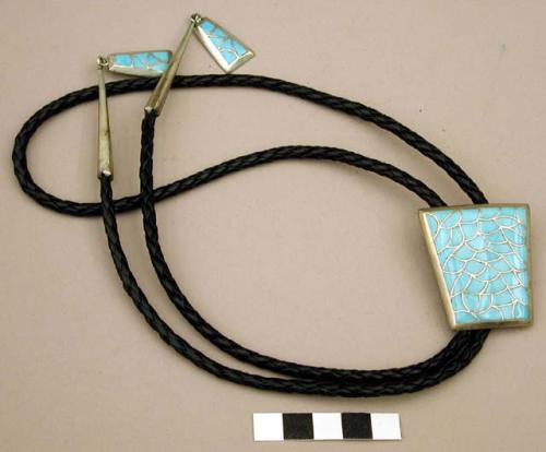 Bolo, small shield with overall turquoise channel work, also on terminals