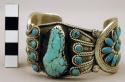 Cuff bracelet, silver band w/ horseshoe shaped sides, set w/ sm. turq. stones