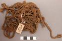 Fragment of blanket or bag of yucca cordage in open plain twining