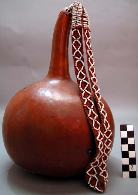 Large gourd rattle (broken) - used for individual singing and by men