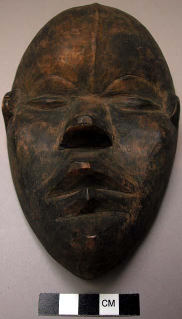 Small wooden face mask.