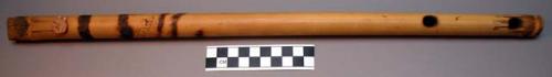 Bamboo flute with pyrographic designs and 3 holes. Lilongwe