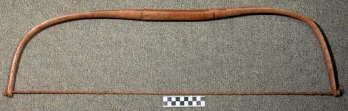 Wooden bow. Ukunji.  with fiber string