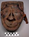 Wooden mask box - carved face for a lid