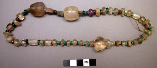 Necklace of glass beads, copper and stone beads