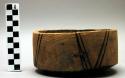 Wooden bowl, to show manner of repairing when split