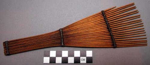 Wooden comb - 22 tines, fan-shape, made of separate sticks bound together with w