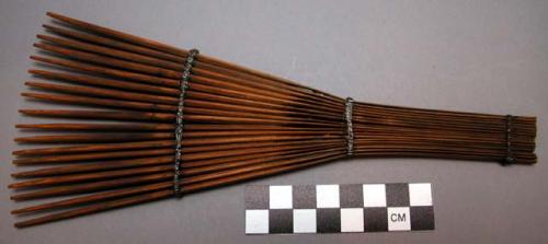 Wooden comb - 18 tines, fan-shape, made of separate sticks bound together with w