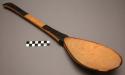 Spoon, carved wood, flaring handle, curved end, pigmented handle & rim