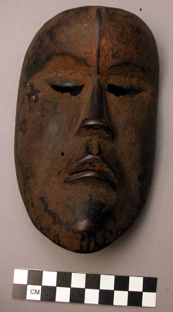 Small wooden face mask.