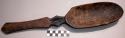 Spoon; carved wood; oval bowl; cut-out handle w/pointed perf. end; abraded