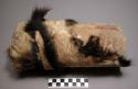 Skin of civet cat, used to cover ko cult objects, and basket in which they are k