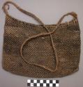 Netted carrying bag made of bromelia fibre