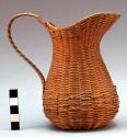 Pitcher-shaped basket