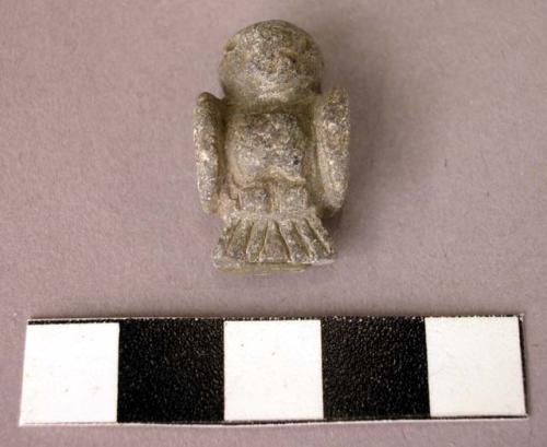 Small stone pendant in form of owl