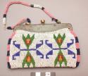 Purse with metal frame, leather foundation covered with bead work
