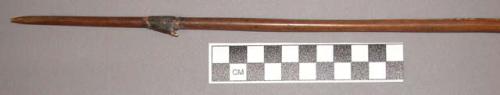 Arrow, bone barb on pointed stick inserted in reed shaft, resin covered fiber