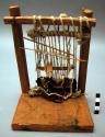 Model of Navajo loom (probably made for tourist trade). height 23.5 cm, width 16