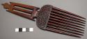 Comb, carved wood, incised geometric designs, cut-out handle, rounded teeth