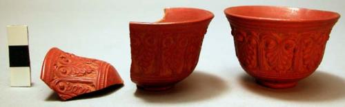 2 Miniature red pottery cups with incised lotus (?) pattern