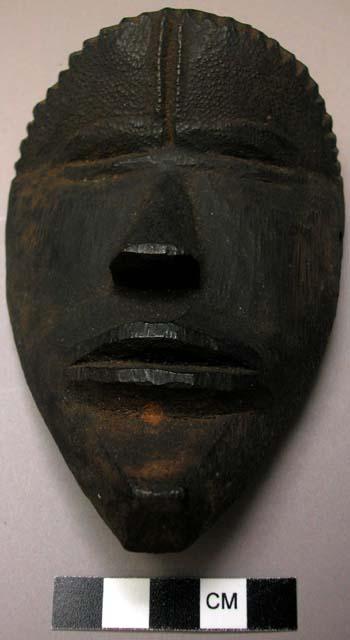 Small wooden mask.