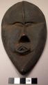 Small wooden mask.- makes a pair with 50/3043