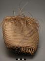 Palmetto bag, unfinished to show how it is made, made by men