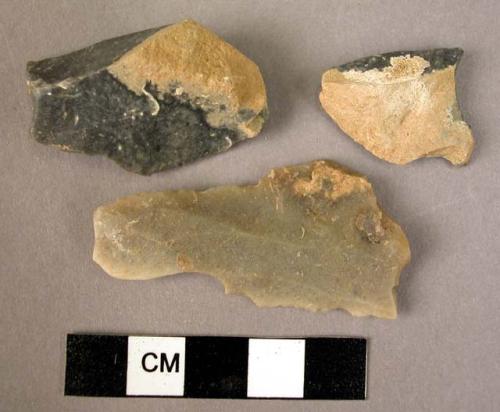 3 flint angle burins on blade: 1 with a square truncations; 2 with a concave tru