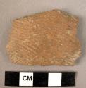 Ceramic body sherd, orange ware, cord impressed design