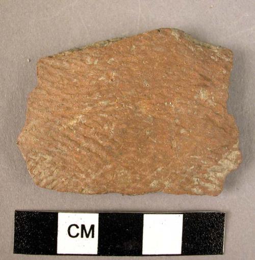 Ceramic body sherd, orange ware, cord impressed design