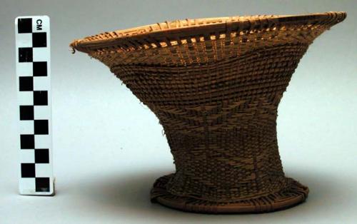 Basketry container for seeds - part of equipment used in making of the poison us