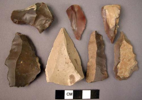 Chipped stone edged tools, unifacially flaked points, roughly triangular